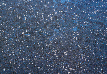 Dark Terrazzo texture. Polished concrete floor and wall pattern. Color surface marble and granite stone, material for decoration. Pattern of mosaic floor with natural stones, granite, marble, quartz. 