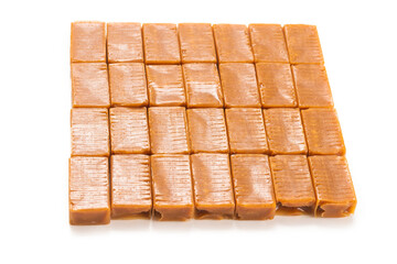 Tasty caramel candy isolated on white background.