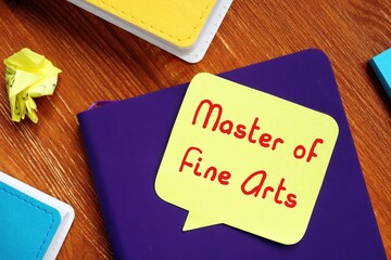 Business concept meaning Master of Fine Arts (MFA) with inscription on the piece of paper.