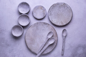 Obraz na płótnie Canvas Handmade handcrafted concrete plates and bowls