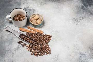 Top view of a Cup of coffee, cappuccino on a table with coffee beans with a wooden spoon