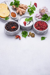 Different Asian spices in small bowls