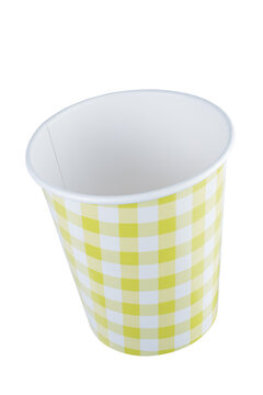 yellow holiday paper cup with a pattern in the form of squares and lines. + clipping path