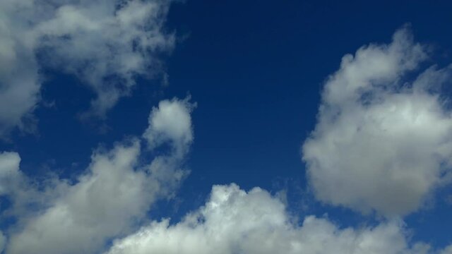 WS Fluffy clouds in blue sky / Mettlach, Saarland, Germany