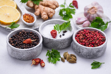 Different Asian spices in small bowls