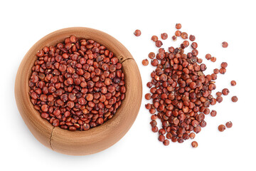 red quinoa seeds in wooden bowl isolated on white background with clipping path and full depth of field. Top view. Flat lay