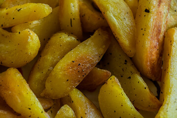 Potatoes Slices Cooked in the Oven Close Up Image