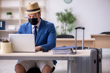 Businessman preparing for trip during pandemic