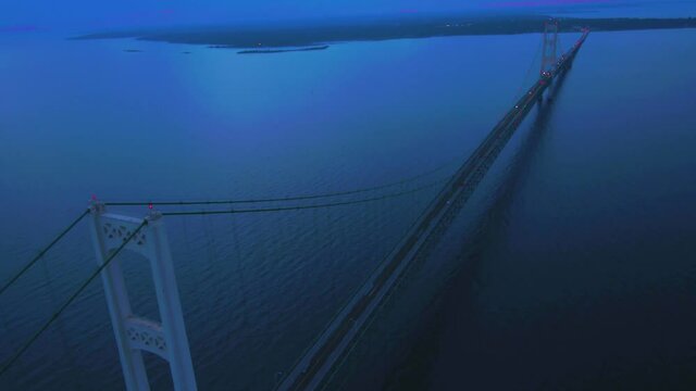 4K Aerial footage of Mackinac Bridge in Michigan during sunset
