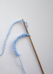 The process of crocheting close-up. Learning to knit. Woman knits.