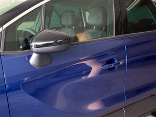 navy blue side view new car