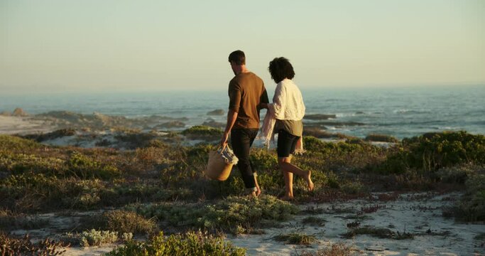 WS Couple walking on beach / Claremont, Cape Town, South Africa