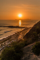 sunset in a city with beach