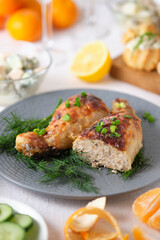 Chicken legs stuffed with meat, mushrooms and cheese. Tasty and beautiful dish on the holiday table.