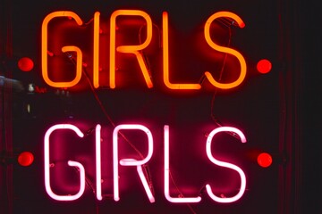 'Girls' neon sign (red and pink)