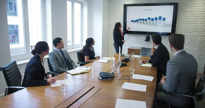 WS Businesswoman giving presentation in conference room / Covent Garden, London, England, United Kingdom