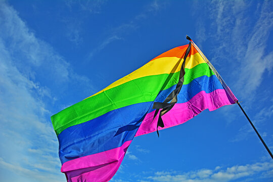 Gay (LGBT) Flag With A Black Ribbon 