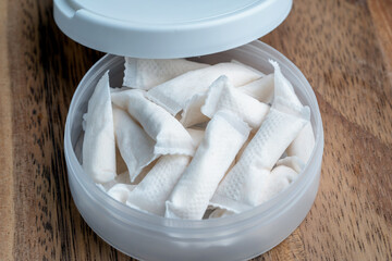 Box of swedish nicotine , snus on wood background
