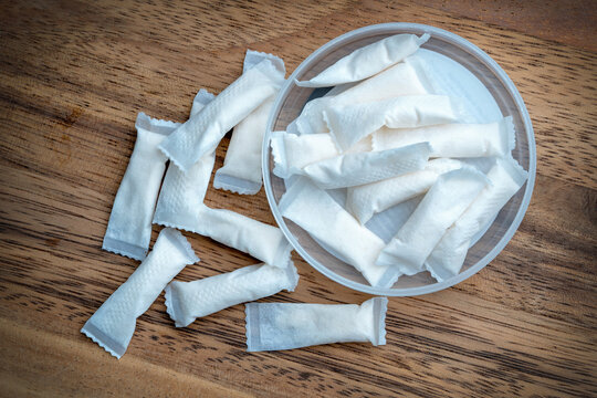 Box of swedish nicotine , snus on wood background
