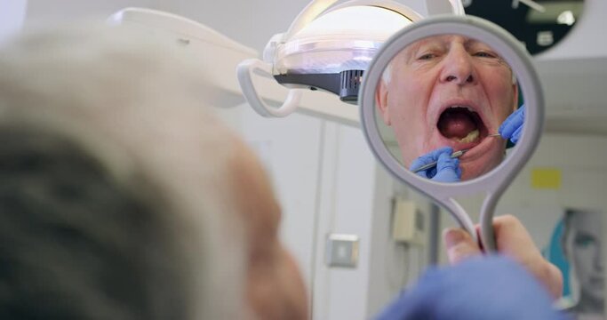 CU R/F Senior man having dentist appointment / Hove, Sussex, England, United Kingdom