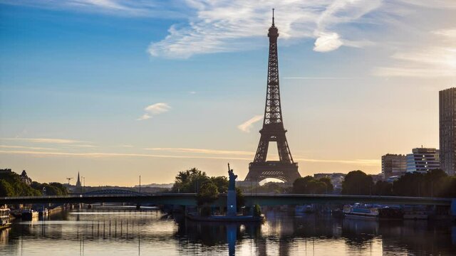 Architecture of Paris with Eiffel Tower, Pont de Grenelle over Seine river and Statue de la Liberte Paris