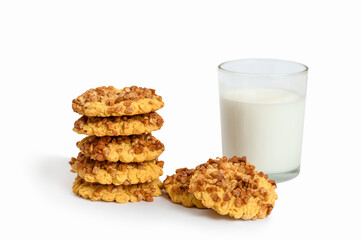 Fototapeta na wymiar Homemade cookies with peanuts and a glass of milk on a white background