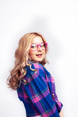 Fototapeta premium young pretty blond teenage hipster girl in glasses posing emotional happy smiling, gesturing isolated on white background, lifestyle poeple concept