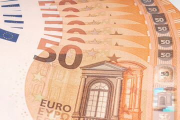 50 euro bills stacked up, slightly out of focus