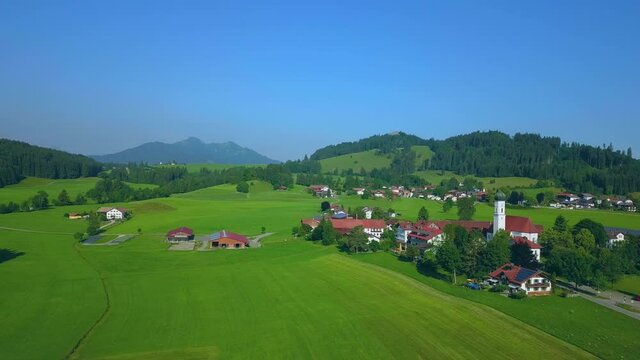 AERIAL WS Landscape with Pilgrimage Church of Maria Hilf and village / Speiden near Eisenberg, Allgaeu, Upper Bavaria, Germany