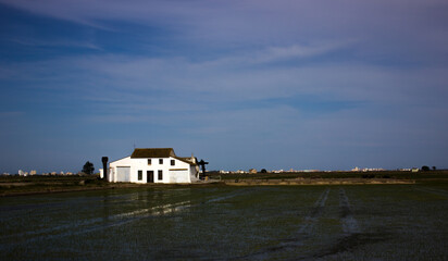 Old country house in front of the lake of L’albufera of Valencia
