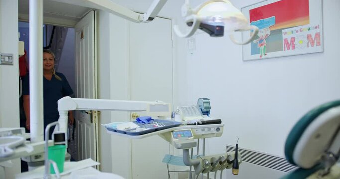 WS Mother and son (8-9) at dentist appointment / Hove, Sussex, England, United Kingdom