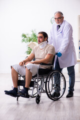 Fototapeta na wymiar Young face injured man visiting experienced male doctor traumato