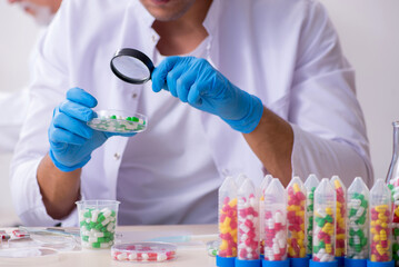 Two chemists working in the lab