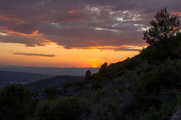 sunset at the mountains of La Font del Barber in Spain