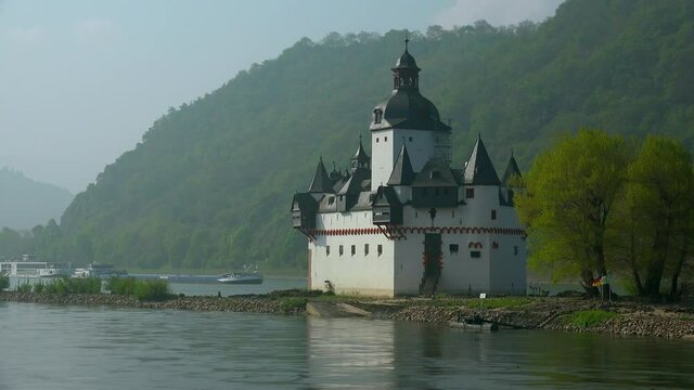 WS Barge passing islet on river with Pfalzgrafenstein Castle / Kaub, Rhineland-Palatinate, Germany