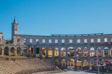 View of Ancient roman amphitheater in the croatian city Pula.
