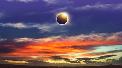 Colorful eclipse of the Sun in clouds sky , apocalypse sunset