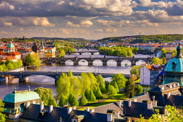 Scenic view of the Old Town pier architecture and Charles Bridge over Vltava river in Prague, Czech...