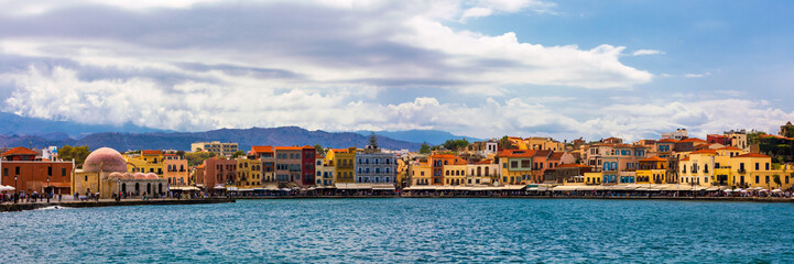 Picturesque old port of Chania. Landmarks of Crete island. Greece. Bay of Chania at sunny summer day, Crete Greece. View of the old port of Chania, Crete, Greece. The port of chania, or Hania.