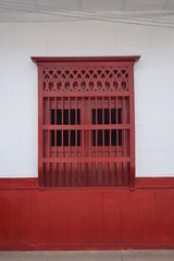 red window with red shutters