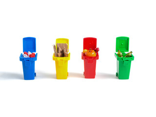 multicolored bins with sorted garbage