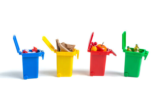 multicolored bins with sorted garbage
