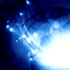 blue circles with bright rays of light © Sergii