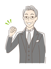 ガッツポーズする男性