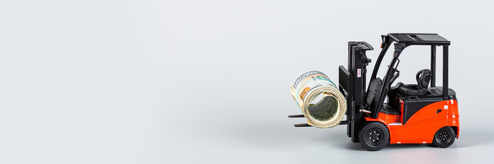 forklift with roll of dollars on gray background. Strongest financial assistance, support of business and people after coronavirus covid-19 pandemic. Mockup with copy space