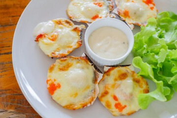 Baked Scallops topping with cheese