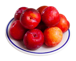 Naklejka na ściany i meble Whole and halves red appetizing plums