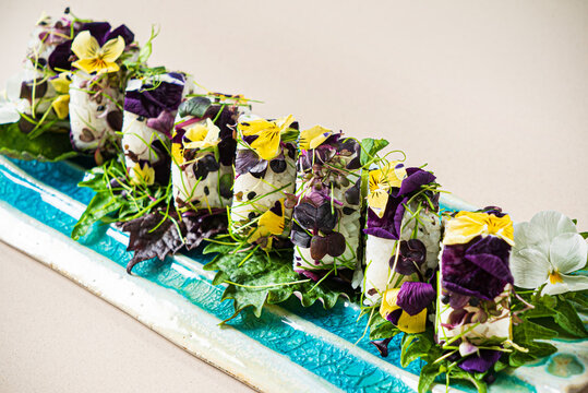 creative sushi with edible flowers