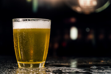 Beer glass on the bar counter.