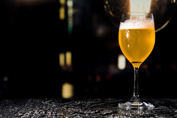 Beer glass on the bar counter.
